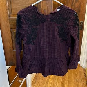 Cute peplum top that buttons up the back